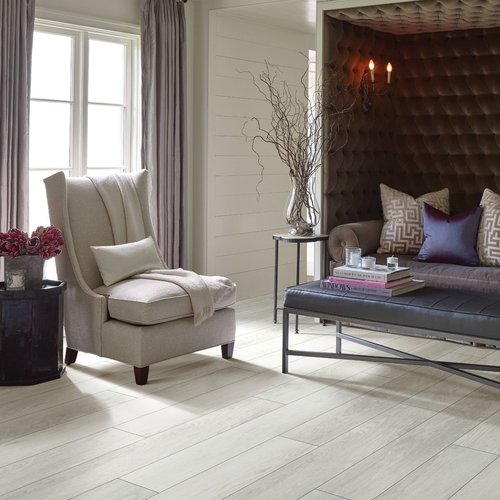 The room with an armchair from Carpet Express Inc in Clarksville, TN